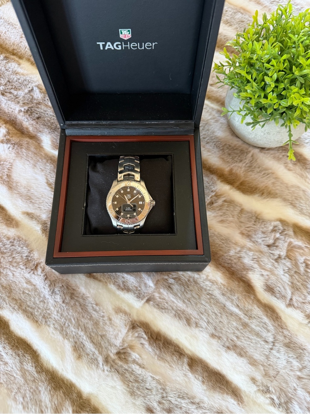 Tag Heuer Silver Watch with Black Dial